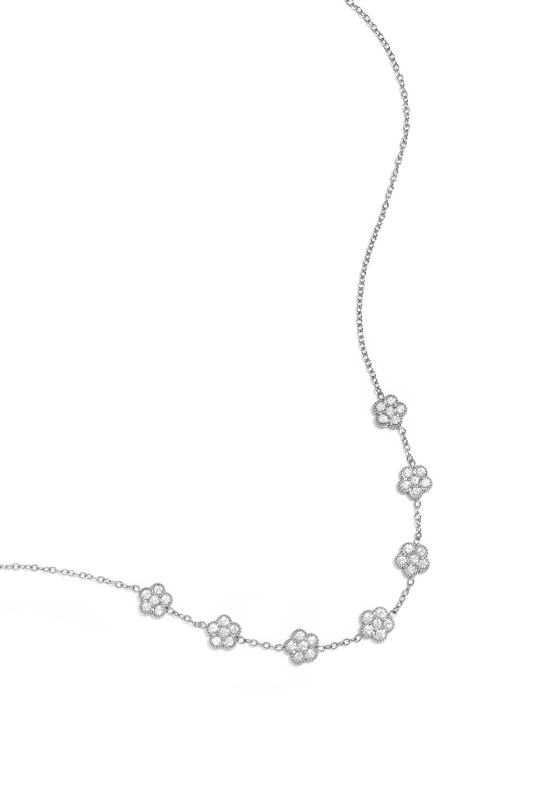 Elegante ketting met zirkonia belegde bloemen