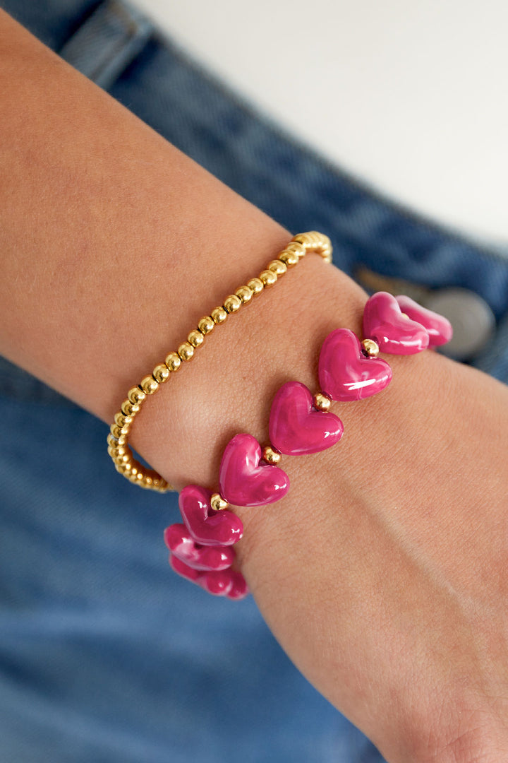 Elastieken hartjes kralenarmband